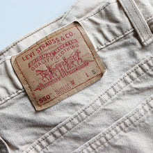 Load image into Gallery viewer, 1990's "LEVI'S" 550 SLIM TAPARED DENIM PANTS (W33×L32 / MADE IN USA)