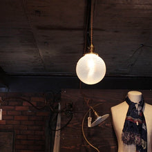 Load image into Gallery viewer, ANTIQUE OPEALESCENT SWIRL GLOBE GLASS SHADE WITH BRASS SOCKET