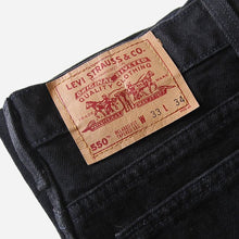 Load image into Gallery viewer, 1990's "LEVI'S" 550 TAPARED BLACK DENIM PANTS (W33) MADE IN USA